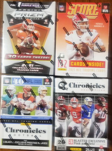 4 NFL football blasters. 1 chronicle, 1 Chronicle draft,  1 score ,1 prizm draft