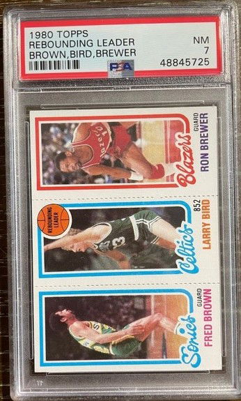 1980 Topps Larry Bird Rookie (Rebounding Leader), Fred Brown, & Ron Brewer PSA 7