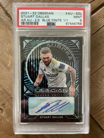 2021-22 Panini Obsidian Stuart Dallas Blue Finite 1/1 PSA 9
