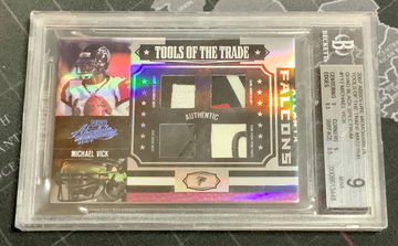 2007 Absolute Memorabilia Tools Of The Trade Quad Black Spectrum 1/1.Helmet,Jersey,Pants & Shoe Michael Vick BGS 9