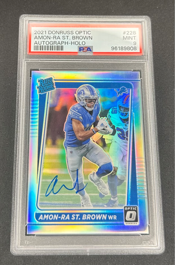 2021 Amon Ra St Brown Panini Donruss Optic Rookie Holo Prizm Auto /125 PSA 9 #228 RC SP Autograph
