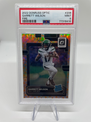 Garrett Wilson ‘22 Donruss Optic Football Rated Rookie Fire Parallel (Case Hit) PSA 9