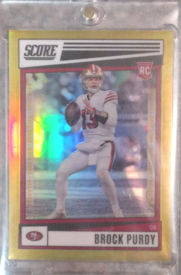 2022 PANINI CHRONICLES SCORE #SP-401 GOLD ZONE PRIZM 21/50 ROOKIE BROCK PURDY