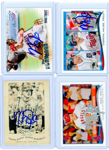 Four card Mike Trout lot. All 4 have been signed but have NOT been authenticated. Please bid accordingly.