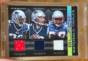 2012 Panini Black Tom Brady Curtis Martin Devin McCourty Materials Triples Game Worn Jersey /50