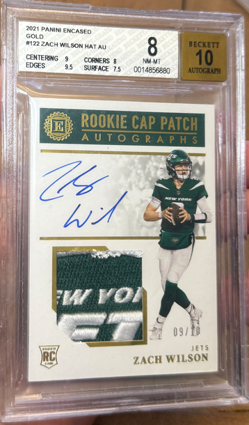 2021 Panini Encased Zach Wilson Rookie Cap Logo Patch Auto Gold /10 BGS 8 Auto 10