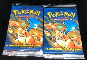 2 1999 Pokemon Base Set Unlimited Sealed Charizard Booster Packs