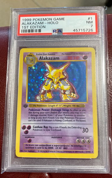 1999 Pokémon game alakazam holo 1st edition psa 7 #1/102