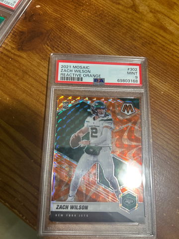 2021 Mosaic #302 Zach Wilson RC Reactive Orange PSA 9