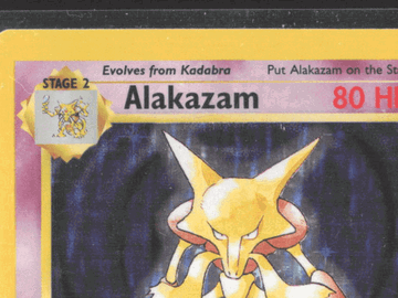 1999 Pokemon Base Set Alakazam Holo Rare 1/102 Trading Card Wizards of the Coast