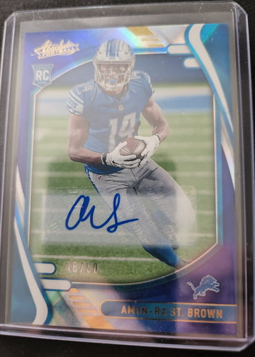 2021 Absolute Amon-Ra St. Brown Spectrum Blue /50 auto