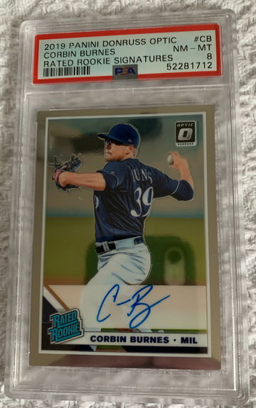 2019 Panini Donruss Optic Corbin Burnes Rated Rookie Signatures PSA 8.  Highest rated PSA card available.