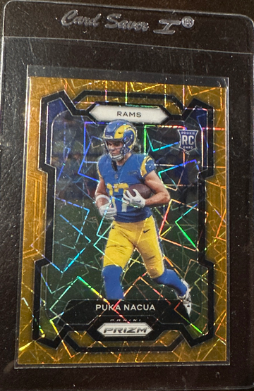 2023 Panini Prizm Football Puka Nacua Orange Lazer Rookie RC #357 LA Rams