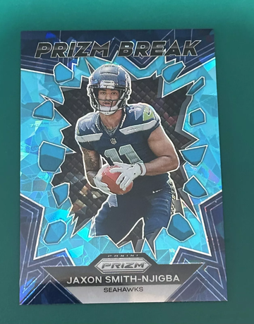 2023 Prizm Jaxon Smith-Njigba Prizm Break Blue Ice /99 #PB-2