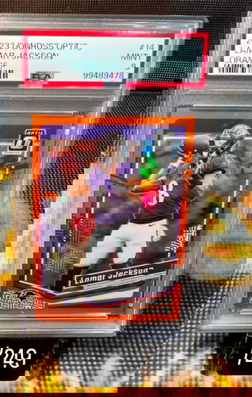 2023 Optic /249 Orange #14 Lamar Jackson PSA 9