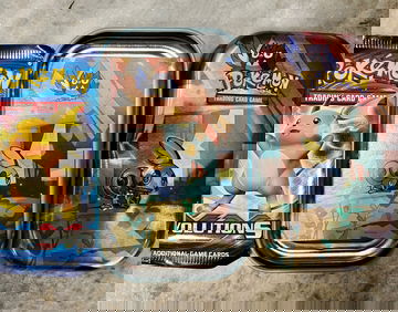 Pokémon XY Evolutions Booster Pack and tin