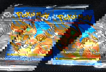 2 1999 Pokemon Base Set Unlimited Sealed Charizard Booster Packs