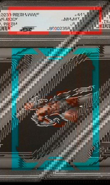 2023 Prizm WWE The Rock Teal Pirzm #41 PSA 8 [MS-1A.1]