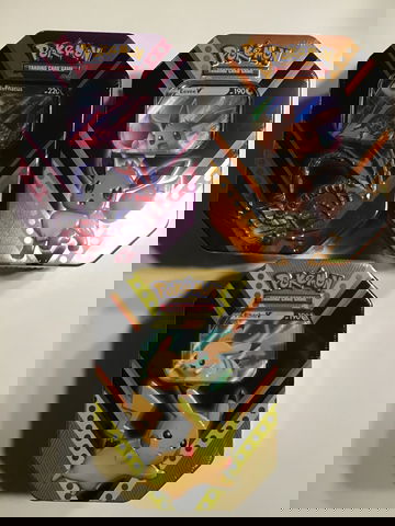 Assorted Pokemon Trading Card Tin Lot of 3