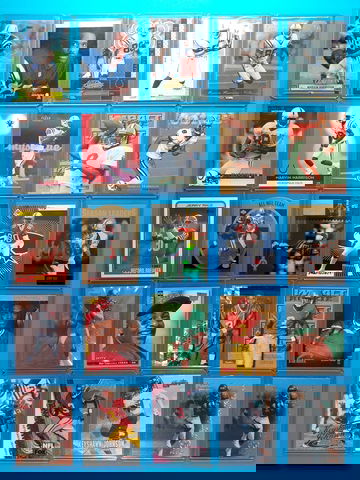 25 lot of Jerry Rice, Marvin Harrison, and Keyshawn Johnson NFL football cards.