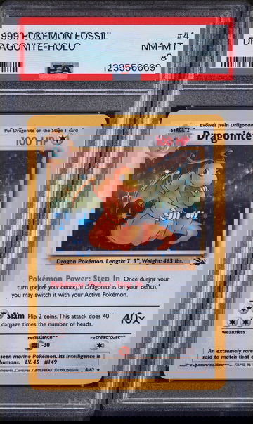 1999 Pokémon Fossil Dragonite #4/62 Holo PSA 8