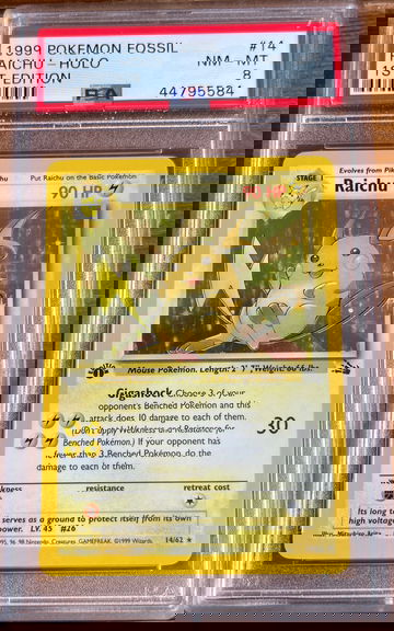 1999 Pokémon Fossil Raichu HOLO 1st Edition PSA 8