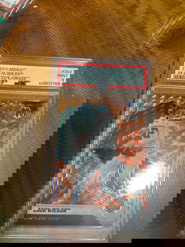 2021 Mosaic #302 Zach Wilson RC Reactive Orange PSA 9