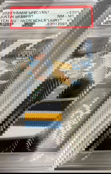 2020 spectra Justin Herbert neon black light PSA 8