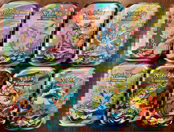 Pokémon Prismatic Evolutions Tin Lot x8